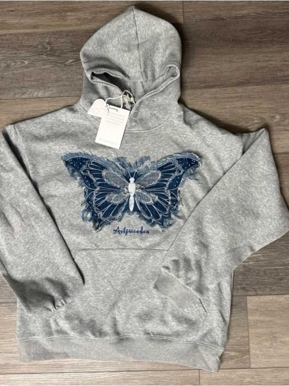 Aelfric Eden Gray Crewneck with Blue Butterfly Motif
